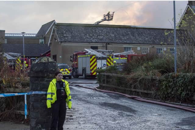 One eyewitness said the fire had devastated entire buildings at the school. He said: "The art department and the old PE hall have all but gone." Picture: Gareth Easton