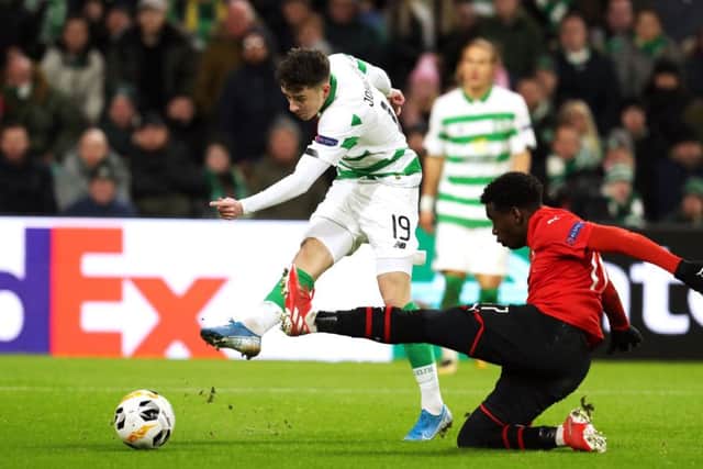 Celtic's Mikey Johnston scores his side's third goal against Rennes. Picture: Andrew Milligan/PA Wire