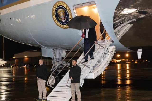 President Donald Trump steps off Air Force One at Ramstein Air Base, Germany,  en route back to his Mar-a-Lago estate in Palm Beach after the surprise visit to Afghanistan.