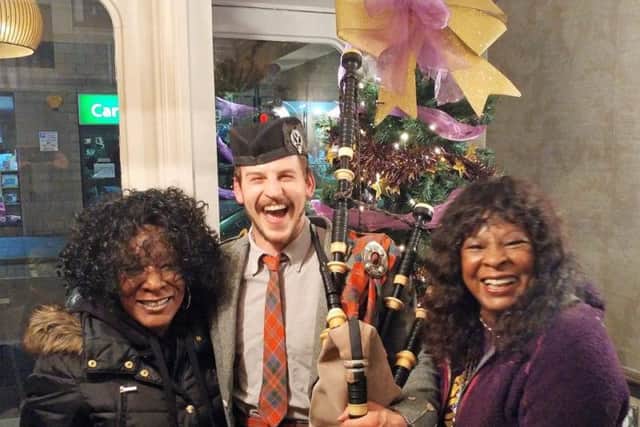 Iain MacGillivray is  pictured with singer Martha Reeves and her sister Louis. The clansman supported the soul singer on stage at the SSE Hydro in front of 12,000 people. PIC: Contributed.