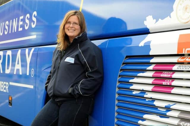 Michelle Ovens, director of Small Business Saturday, outside the campaign bus. Picture: Contributed