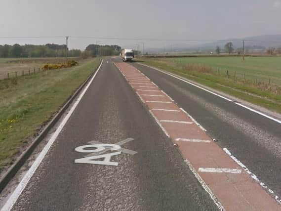The collision, which took place at around 5:10pm on Friday, involved a grey Peugeot 208 and a grey Ford Edge near Alness Point.