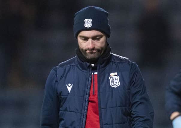 Dundee manager James McPake looks dejected at full time. Picture: Craig Foy / SNS
