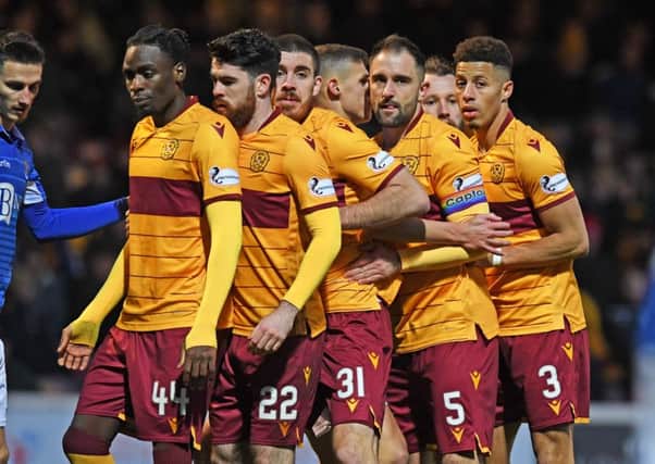 The Motherwell players get into formation for a corner against St Johnstone. Picture: Craig Williamson / SNS