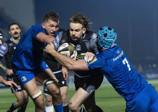 Ruaridh Jackson on the charge. The Glasgow Warriors full-back scored two tries and could have had a third. Picture: Gary Hutchison / SNS