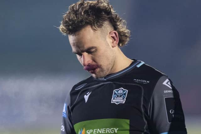Ruaridh Jackson scored two tries for Glasgow but cut a dejected figure at full-time. Picture: Gary Hutchison/SNS