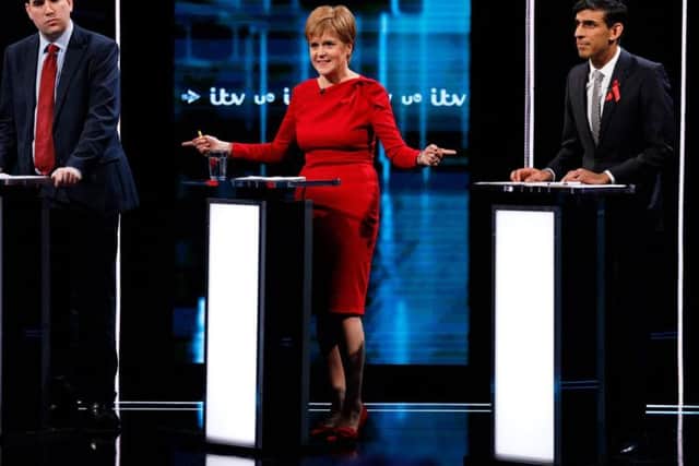 Nicola Sturgeon appears in last night's ITV election debate alongside Labour Party MP Richard Bergen (left) and Conservative MP Rishi Sunak (right) who both stood in for their party leaders. Picture: Getty