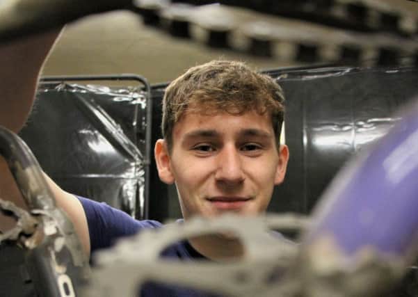 Oscar is now working in a bicycle workshop thanks to Change Cycle