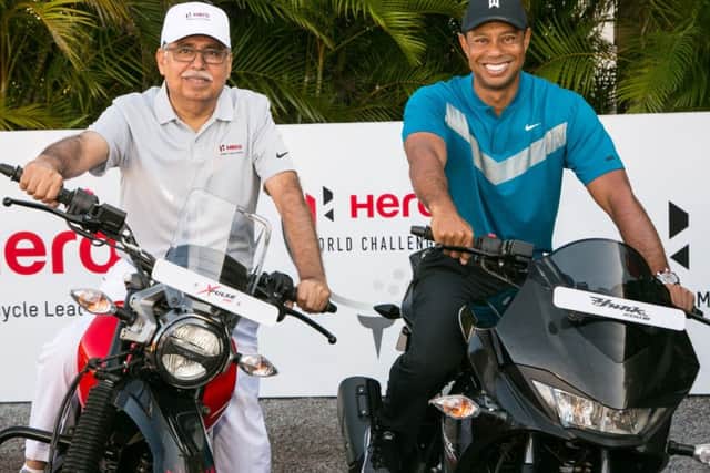 Five-time winner Tiger Woods with Dr Pawan Munjal, chairman at Hero MotoCorp, ahead of the 2019 Hero World Challenge at Albany Golf Club in the Bahamas.