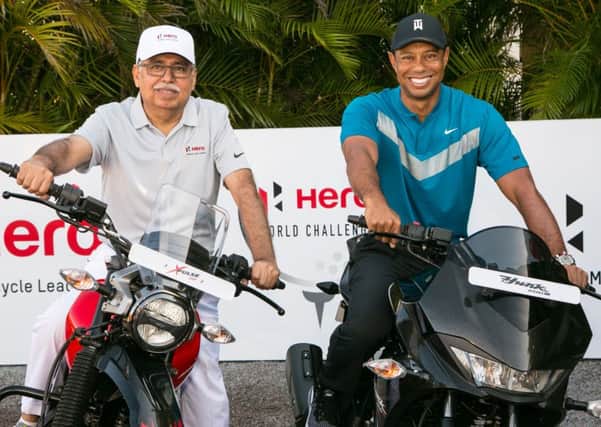 Five-time winner Tiger Woods with Dr Pawan Munjal, chairman at Hero MotoCorp, ahead of the 2019 Hero World Challenge at Albany Golf Club in the Bahamas.