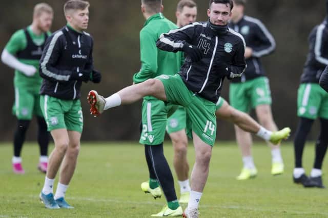 Hibs midfielder Stevie Mallan gets loose during training at East Mains ahead of the match away at Ross County. Picture: Bruce White/SNS