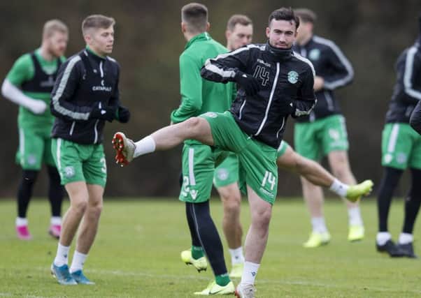 Hibs midfielder Stevie Mallan gets loose during training at East Mains ahead of the match away at Ross County. Picture: Bruce White/SNS