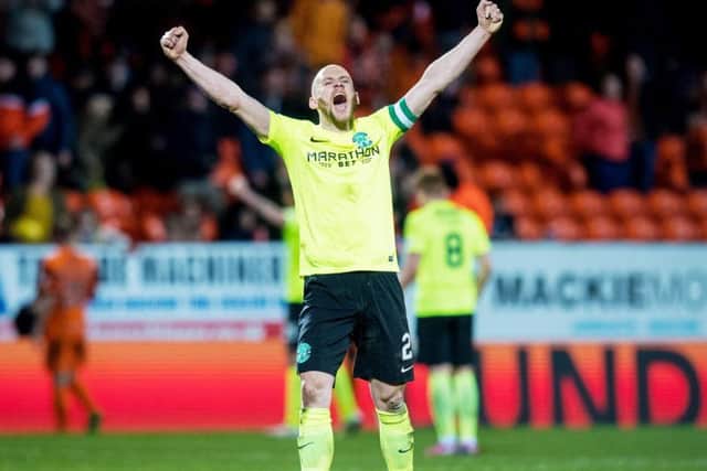 David Gray celebrates after Hibs won on their last trip to Tannadice. Picture: SNS