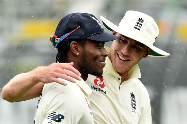 England's pacemen Jofra Archer and Stuart Broad leave the field as rain stops play on the fifth day of the second Test. Picture: Peter Parks/AFP via Getty Images
