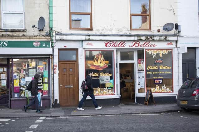 The takeaway owner was even forced to call police - claiming teachers went inside and started giving out detentions to children and booting them out. Picture: SWNS