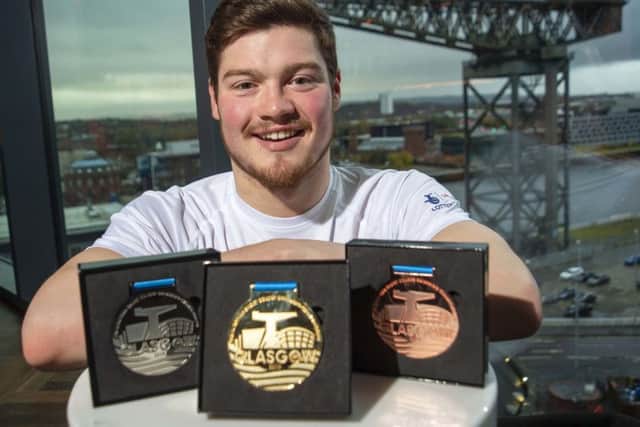 Scott McLay with the official medals for Glasgow 2019, the LEN European short-course championships. Picture: Bill Murray/SNS