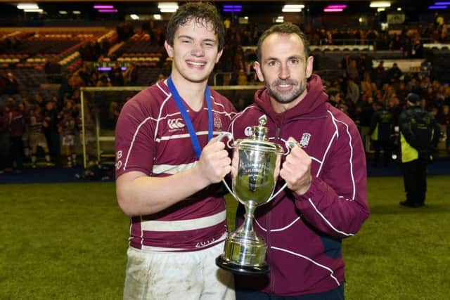 George Watson's coach Ally Donaldson, right, tasted success with captain Kenny Drummond in the 2015 U18 Scottish Schools Cup final. Picture: SNS