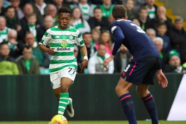 Karamoko Dembele of Celtic is faced by Conor Shaughnessy of Hearts. (Photo by Alex Burstow/Getty Images)