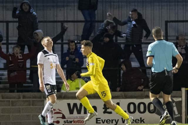 Dunfermline's Kevin Nisbet wheels away after scoring the only goal of the game at Somerset Park. Picture: Alan Harvey/SNS