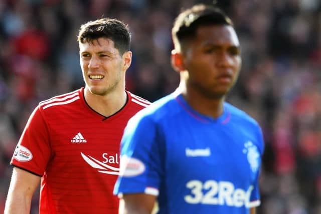 Aberdeen defender Scott McKenna says Alfredo Morelos' discipline has improved. Picture: Craig Foy/SNS