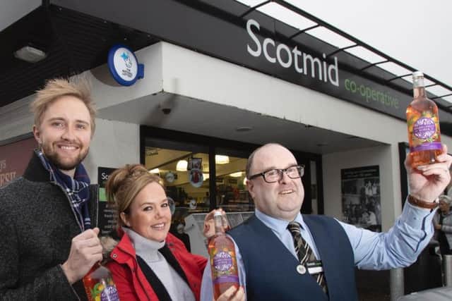Sparklingly Sober co-founders Craig Strachan and Hannah Fisher with Scotmid store manager David Dick. Picture: Contributed
