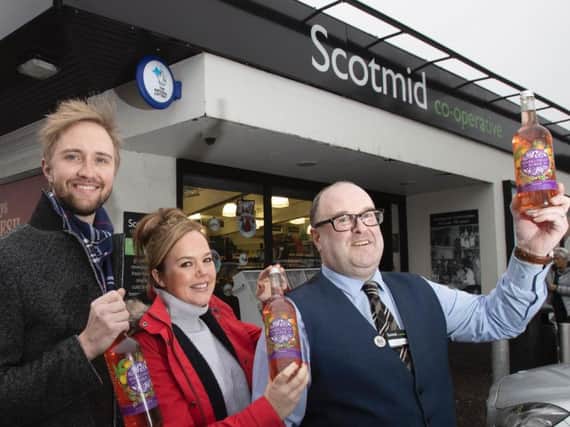 Sparklingly Sober co-founders Craig Strachan and Hannah Fisher with Scotmid store manager David Dick. Picture: Contributed