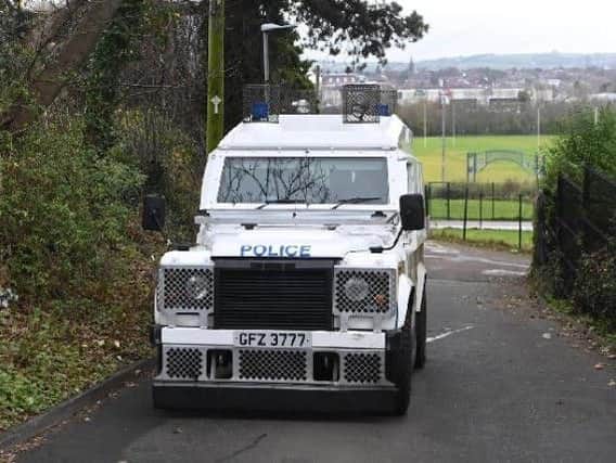 A PSNI Land Rover at the scene of the attack in Belfast on Wednesday morning. (Photo: Pacemaker/ Belfast Newsletter)