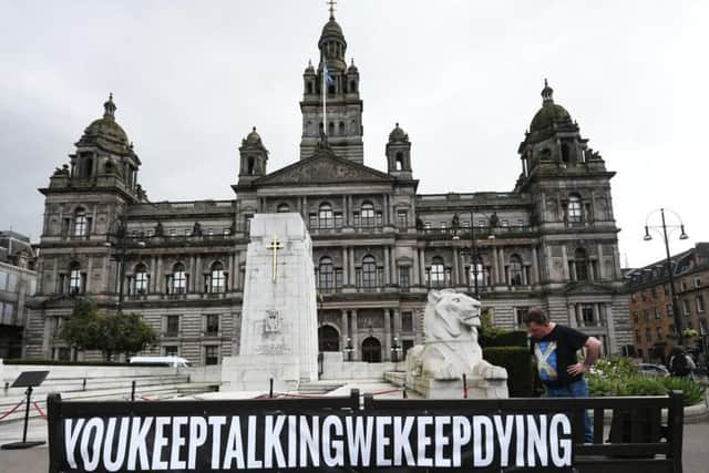 Campaigners for drug law reform in Glasgow's George Square