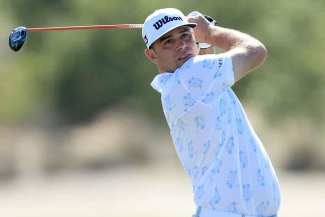 Gary Woodland, with turtles adorning his shirt, plays his second shot on the third hole during the first round of the 2019 Hero World Challenge in Nassau. Picture: David Cannon/Getty Images