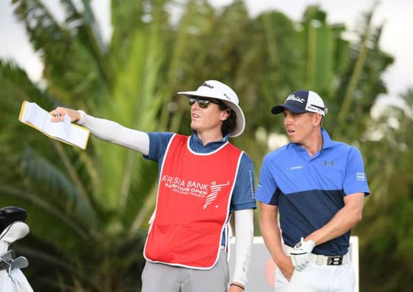 Grant Forrest and his caddie John McClure talk tactics during the first round of the AfrAsia Bank Mauritius Open. Picture: Getty Images