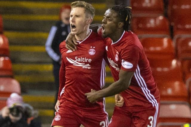 Aberdeen's Jon Gallagher celebrates with Zak Vyner after scoring against Rangers. Picture: Alan Harvey/SNS