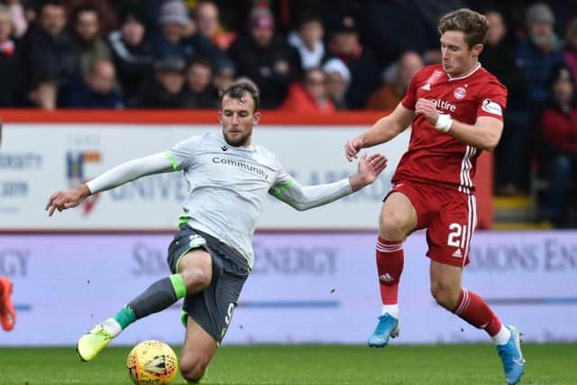 Christian Doidge in action for Hibs against Aberdeen during the last meeting between the two teams