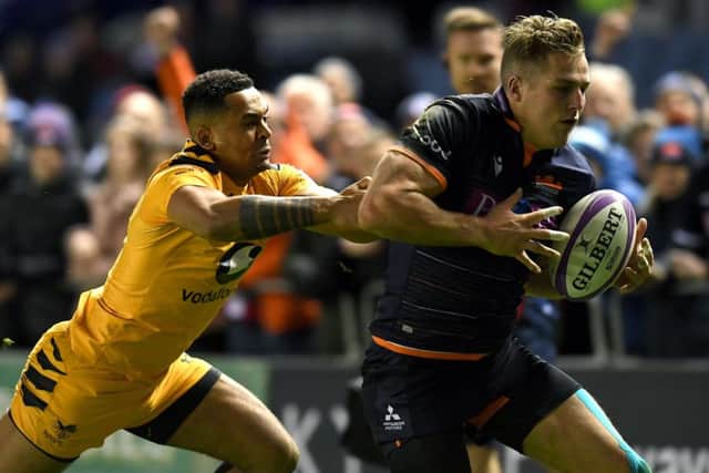 Edinburgh winger Duhan van der Merwe races for the line as he scores the opening try of the game chased by Zach Kibirige of Wasps. Picture: Mark Runnacles/Getty Images