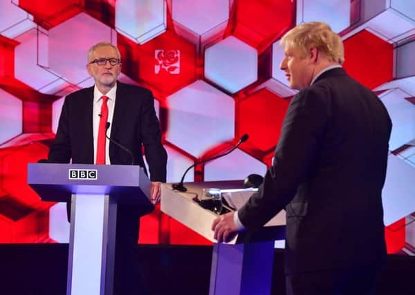 Jeremy Corbyn and Boris Johnson go head to head on Friday's live debate on the BBC. Picture: BBC/Getty
