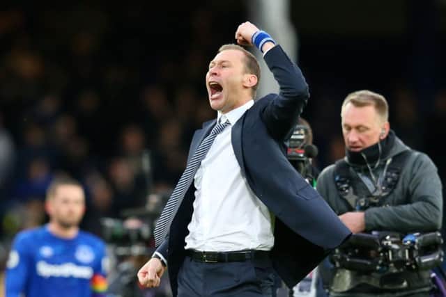 Interim Everton manager Duncan Ferguson, wearing his trademark wristband, celebrates victory over Chelsea. Picture: Alex Livesey/Getty Images