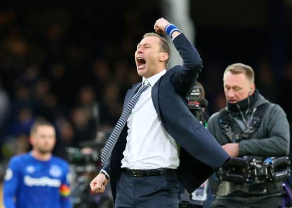 Interim Everton manager Duncan Ferguson, wearing his trademark wristband, celebrates victory over Chelsea. Picture: Alex Livesey/Getty Images