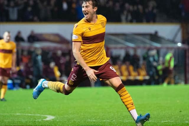 Chris Long celebrates his goal for Motherwell