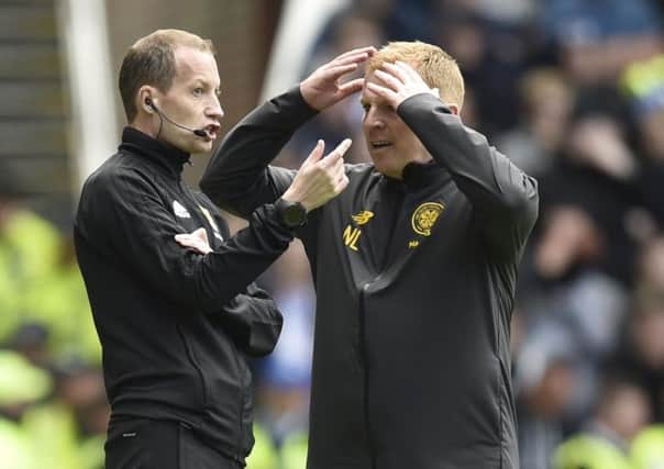 Celtic manager Neil Lennon with Willie Collum during the Ladbrokes Premiership match against Rangers at Ibrox in September. Picture: Rob Casey / SNS