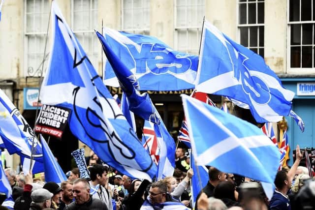 Pro-independence supporters march through Edinburgh. Picture: PA