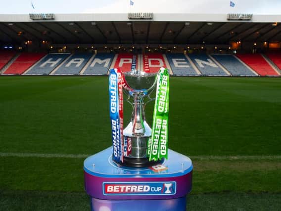 Who will climb the Hampden stairs to lift the League Cup this afternoon?
