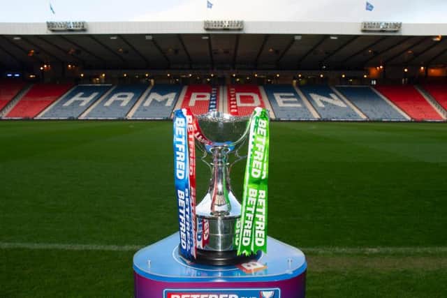Who will climb the Hampden stairs to lift the League Cup this afternoon?