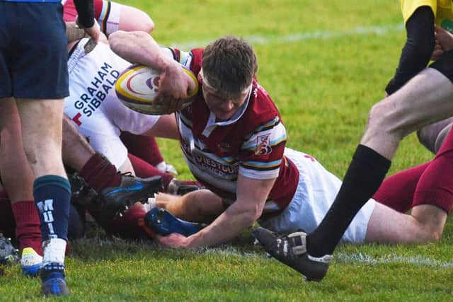 Watsonians substitute Campbell Wilson dives over to score the Super6 leaders' third try against Boroughmuir Bears at Myreside. Picture: Ross MacDonald/SNS/SRU