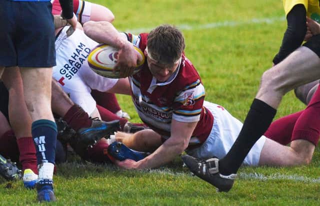 Watsonians substitute Campbell Wilson dives over to score the Super6 leaders' third try against Boroughmuir Bears at Myreside. Picture: Ross MacDonald/SNS/SRU