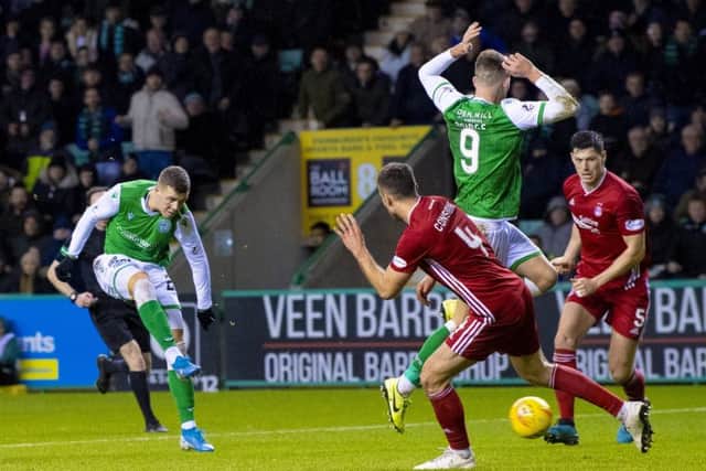 Florian Kamberi fires home Hibs third goal at Easter Road. Picture: SNS.