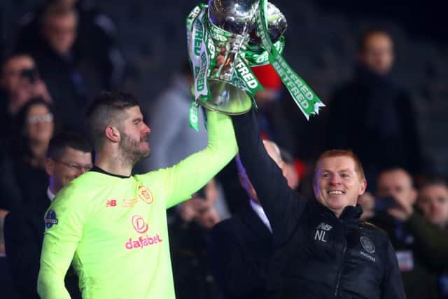 Fraser Forster and Neil Lennon lift the Betfred Cup. Picture: Getty