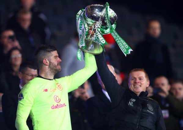 Fraser Forster and Neil Lennon lift the Betfred Cup. Picture: Getty