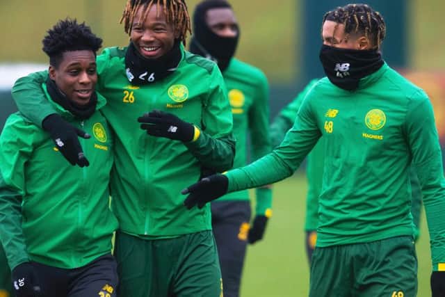 Armstrong Okoflex (far right) is a target for clubs in England - and the English national team, according to reports