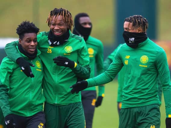 Armstrong Okoflex (far right) is a target for clubs in England - and the English national team, according to reports
