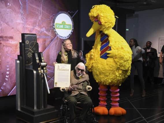 Sesame Street's Big Bird and puppeteer Caroll Spinney  (Photo by Evan Agostini/Invision/AP, File)