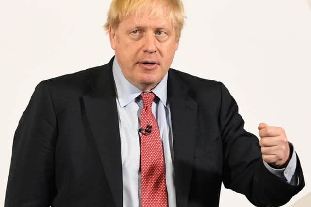 Boris Johnson has been accused of "running scared" of Scottish voters.